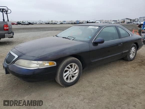 ✅ 1998 Lincoln Mark VIII • VIN: 1LNFM91V1WY700662 • Лот: 57137004. Опубликован ранее на Copart с пробегом 149 927 миль. Бесплатный доступ к архиву аукционных продаж из США и подробный отчёт об истории автомобиля на DreamBid. Изображение 1.
