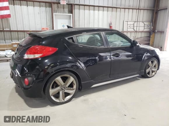 ✅ 2013 Hyundai Veloster Turbo • VIN: KMHTC6AE2DU110723 • Lot: 78014864. Wystawiony na Copart z przebiegiem 131 669 mil. Bezpłatny archiwum sprzedaży aukcyjnych z USA i szczegółowy raport historii pojazdu na DreamBid. Zdjęcie 3.