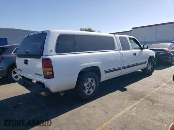2002 Chevrolet Silverado 1500 with VIN 1GCEC19T02E150146, listed as a Copart auction lot 77425664 with 295,228 mi miles and Salvage title. Bid and sale history available at DreamBid. Image 3.