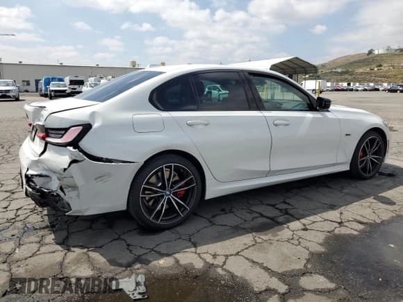 ✅ 2023 BMW 3 Series 330e • VIN: 3MW39FF05P8D05889 • Лот: 54780845. Опубликован ранее на Copart с пробегом 42 773 миль. Бесплатный доступ к архиву аукционных продаж из США и подробный отчёт об истории автомобиля на DreamBid. Изображение 3.
