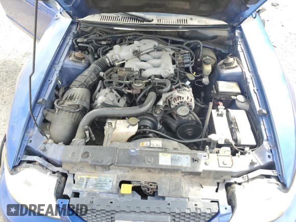 ✅ 2003 Ford Mustang Standard • VIN: 1FAFP40493F373920 • Lot: 57312595. Listed on Copart with 164,986 mi. Free auction sales archive from the USA and detailed vehicle history report at DreamBid. Image 11.