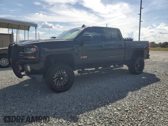 2016 Chevrolet Silverado 1500 LT z VIN 3GCUKREC8GG341252, wystawiony jako Copart lot #85679065 z przebiegiem 180 123 mil mil oraz Szkoda całkowita • Salvage title. Historia ofert i sprzedaży dostępna na DreamBid. Obrazek 1.