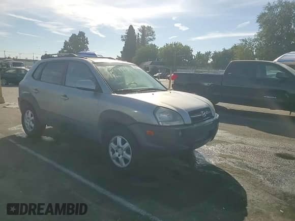 2005 Hyundai Tucson GLS z VIN KM8JN12D95U093916, wystawiony jako Copart lot #76326214 z przebiegiem 159 295 mil mil oraz Szkoda całkowita • Salvage title. Historia ofert i sprzedaży dostępna na DreamBid. Obrazek 11.