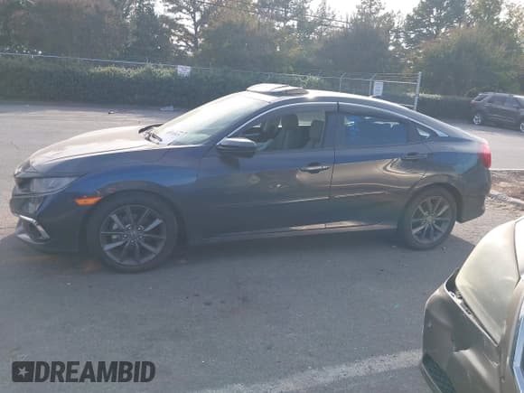 ✅ 2021 Honda Civic EX • VIN: 19XFC1F39ME000861 • Lot: 43518529. Listed on IAAI with 84,493 mi. Free auction sales archive from the USA and detailed vehicle history report at DreamBid. Image 14.