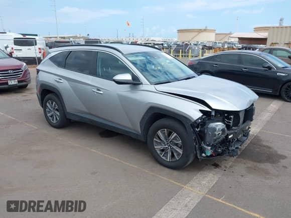 2023 Hyundai Tucson Blue z VIN KM8JBCA16PU097422, wystawiony jako IAAI lot #42138545 z przebiegiem 14 826 mil mil oraz . Historia ofert i sprzedaży dostępna na DreamBid. Obrazek 1.