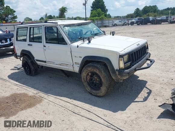✅ 1993 Jeep Cherokee • VIN: 1J4FT28S5PL640159 • Lot: 43117982. Listed on IAAI with 265,513 mi. Free auction sales archive from the USA and detailed vehicle history report at DreamBid. Image 1.