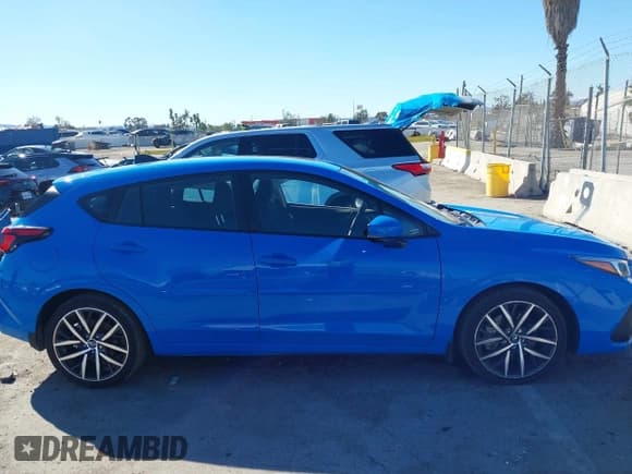 ✅ 2024 Subaru Impreza Special Sports • VIN: JF1GUAFC5R8284594 • Lot: 43455393. Listed on IAAI with 14,992 mi. Free auction sales archive from the USA and detailed vehicle history report at DreamBid. Image 13.