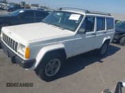 ✅ 1996 Jeep Cherokee Sport • VIN: 1J4FT68S7TL265733 • Lot: 42499228. Listed on IAAI with 230,001 mi. Free auction sales archive from the USA and detailed vehicle history report at DreamBid. Image 2.