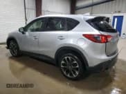 ✅ 2016 Mazda CX-5 Grand Touring • VIN: JM3KE4DY6G0697239 • Lot: 91906105. Listed on Copart with 139,896 mi. Free auction sales archive from the USA and detailed vehicle history report at DreamBid. Image 2.