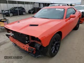 ✅ 2021 Dodge Challenger SXT • VIN: 2C3CDZAG2MH552672 • Lot: 37277363. Wystawiony na Copart z przebiegiem 10 669 mil. Bezpłatny archiwum sprzedaży aukcyjnych z USA i szczegółowy raport historii pojazdu na DreamBid. Zdjęcie 1.