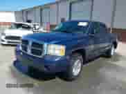 2006 Dodge Dakota SLT with VIN 1D7HE48N76S702816, listed as a IAAI auction lot 41685793 with 192,271 mi miles and . Bid and sale history available at DreamBid. Image 2.