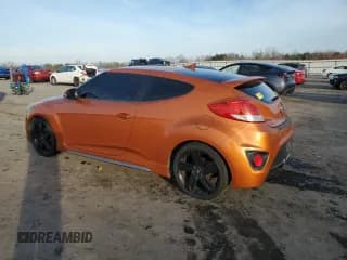 ✅ 2014 Hyundai Veloster Turbo • VIN: KMHTC6AE2EU193216 • Lot: 85075714. Listed on Copart with 96,611 mi. Free auction sales archive from the USA and detailed vehicle history report at DreamBid. Image 2.