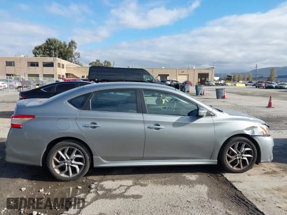 ✅ 2013 Nissan Sentra SV • VIN: 3N1AB7AP4DL701185 • Lot: 43725707. Listed on IAAI with 198,314 mi. Free auction sales archive from the USA and detailed vehicle history report at DreamBid. Image 14.