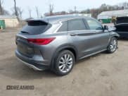 ✅ 2022 Infiniti QX50 Pure • VIN: 3PCAJ5ABXNF115938 • Lot: 41922598. Wystawiony na IAAI z przebiegiem 25 509 mil. Bezpłatny archiwum sprzedaży aukcyjnych z USA i szczegółowy raport historii pojazdu na DreamBid. Zdjęcie 4.