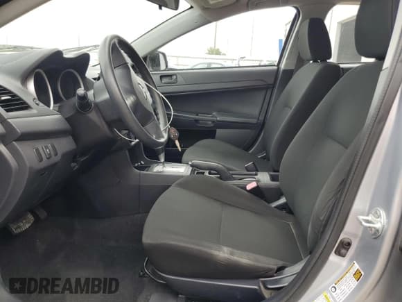 ✅ 2012 Mitsubishi Lancer DE • VIN: JA32U1FU9CU026167 • Lot: 80054024. Wystawiony na Copart z przebiegiem 32 426 mil. Bezpłatny archiwum sprzedaży aukcyjnych z USA i szczegółowy raport historii pojazdu na DreamBid. Zdjęcie 7.