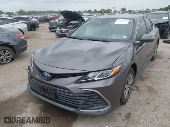 2022 Toyota Camry Hybrid LE with VIN 4T1C31AK6NU591599, listed as a IAAI auction lot 42122052 with 87,292 mi miles and . Bid and sale history available at DreamBid. Image 17.