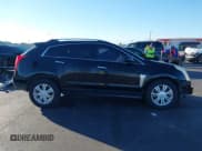 ✅ 2015 Cadillac SRX Luxury Collection • VIN: 3GYFNEE38FS595607 • Lot: 43720579. Listed on IAAI with 103,582 mi. Free auction sales archive from the USA and detailed vehicle history report at DreamBid. Image 14.