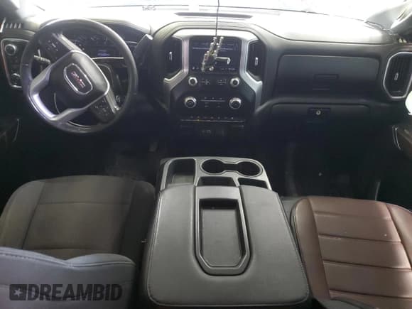 ✅ 2021 GMC Sierra 1500 SLE • VIN: 1GTR9BED8MZ236210 • Лот: 56898185. Опубликован ранее на Copart с пробегом 128 697 миль. Бесплатный доступ к архиву аукционных продаж из США и подробный отчёт об истории автомобиля на DreamBid. Изображение 8.