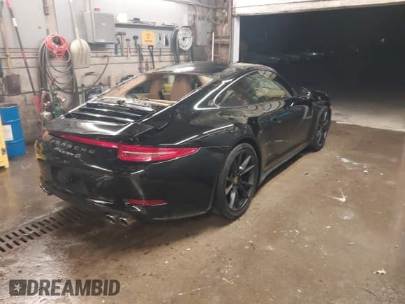 ✅ 2015 Porsche 911 Carrera S • VIN: WP0AB2A96FS125928 • Lot: 43813644. Listed on IAAI with 13,850 mi. Free auction sales archive from the USA and detailed vehicle history report at DreamBid. Image 4.