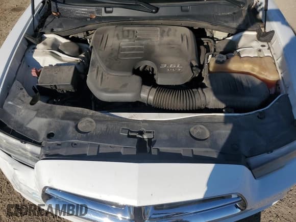 ✅ 2014 Dodge Charger SXT • VIN: 2C3CDXHG0EH318512 • Lot: 65038885. Listed on Copart with 154,429 mi. Free auction sales archive from the USA and detailed vehicle history report at DreamBid. Image 11.