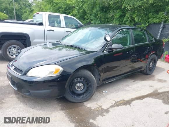 2013 Chevrolet Impala Police with VIN 2G1WD5E39D1263394, listed as a IAAI auction lot 42383103 with 113,929 mi miles and . Bid and sale history available at DreamBid. Image 2.