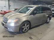 ✅ 2011 Honda Odyssey Touring • VIN: 5FNRL5H97BB075863 • Лот: 91788115. Опубликован ранее на Copart с пробегом 141 039 миль. Бесплатный доступ к архиву аукционных продаж из США и подробный отчёт об истории автомобиля на DreamBid. Изображение 1.