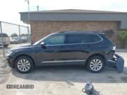 ✅ 2018 Volkswagen Tiguan SEL • VIN: 3VV2B7AX0JM084778 • Лот: 43200447. Опубликован ранее на IAAI с пробегом 77 889 миль. Бесплатный доступ к архиву аукционных продаж из США и подробный отчёт об истории автомобиля на DreamBid. Изображение 14.