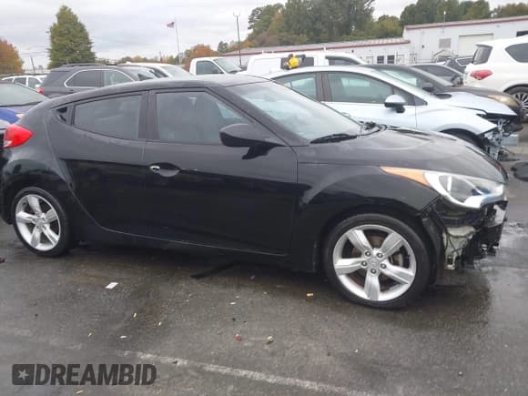 ✅ 2013 Hyundai Veloster w/Black Int • VIN: KMHTC6AD6DU146227 • Lot: 43533594. Wystawiony na IAAI z przebiegiem 104 427 mil. Bezpłatny archiwum sprzedaży aukcyjnych z USA i szczegółowy raport historii pojazdu na DreamBid. Zdjęcie 13.
