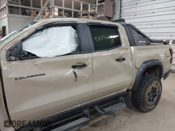 2023 Chevrolet Colorado 4WD ZR2 z VIN 1GCPTFEK4P1215680, wystawiony jako IAAI lot #43174110 z przebiegiem 29 585 mil mil oraz . Historia ofert i sprzedaży dostępna na DreamBid. Obrazek 15.