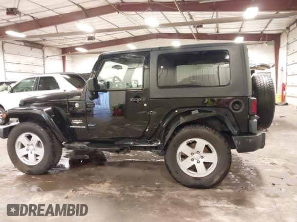 ✅ 2007 Jeep Wrangler Sahara • VIN: 1J8FA54167L197023 • Лот: 42435685. Опубликован ранее на IAAI с пробегом 115 282 миль. Бесплатный доступ к архиву аукционных продаж из США и подробный отчёт об истории автомобиля на DreamBid. Изображение 14.