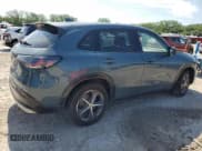 ✅ 2023 Honda HR-V EX-L • VIN: 3CZRZ1H79PM702999 • Lot: 66011095. Wystawiony na Copart z przebiegiem 64 992 mil. Bezpłatny archiwum sprzedaży aukcyjnych z USA i szczegółowy raport historii pojazdu na DreamBid. Zdjęcie 3.