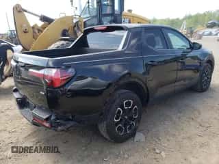 2022 Hyundai Santa Cruz SEL с VIN 5NTJBDAE9NH015673, выставлен на аукционе Copart как лот 66458554 с пробегом 15 874 миль миль и Списание • Salvage title. История ставок и продаж доступна на DreamBid. Изображение 3.