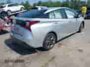 2021 Toyota Prius L Eco with VIN JTDKAMFU5M3137298, listed as a IAAI auction lot 42270937 with 38,828 mi miles and . Bid and sale history available at DreamBid. Image 4.