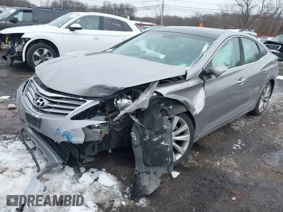 2014 Hyundai Azera Limited with VIN KMHFH4JG6EA361378, listed as a IAAI auction lot 41557210 with 58,561 mi miles and . Bid and sale history available at DreamBid. Image 20.