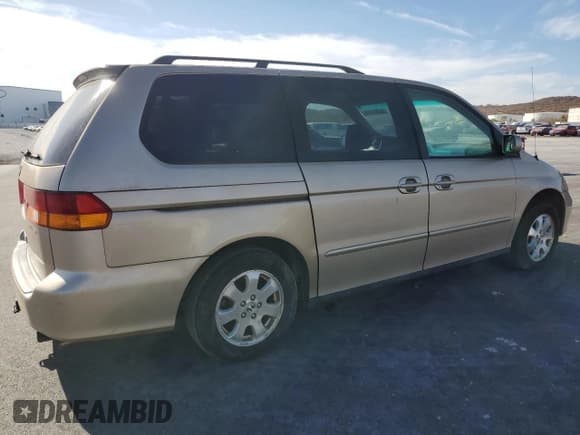 ✅ 2002 Honda Odyssey EX-L • VIN: 2HKRL189X2H589166 • Lot: 92274145. Listed on Copart with 281,010 mi. Free auction sales archive from the USA and detailed vehicle history report at DreamBid. Image 3.