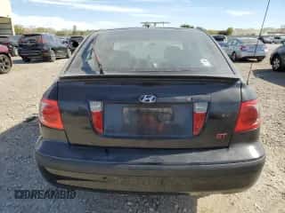 2005 Hyundai Elantra GLS z VIN KMHDN56D05U162233, wystawiony jako Copart lot #75898534 z przebiegiem 289 457 mil mil oraz Szkoda całkowita • Salvage title. Historia ofert i sprzedaży dostępna na DreamBid. Obrazek 6.
