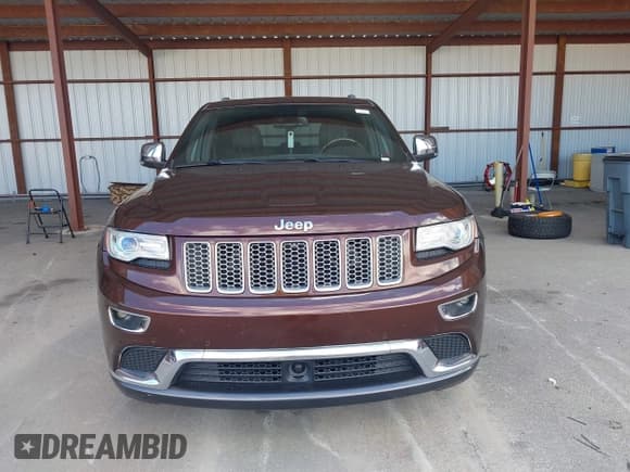✅ 2015 Jeep Grand Cherokee Summit • VIN: 1C4RJEJG2FC829205 • Lot: 43469676. Listed on IAAI with 89,893 mi. Free auction sales archive from the USA and detailed vehicle history report at DreamBid. Image 12.