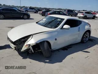 ✅ 2014 Nissan 370Z • VIN: JN1AZ4EH6EM630382 • Lot: 77031944. Wystawiony na Copart z przebiegiem 86 233 mil. Bezpłatny archiwum sprzedaży aukcyjnych z USA i szczegółowy raport historii pojazdu na DreamBid. Zdjęcie 1.
