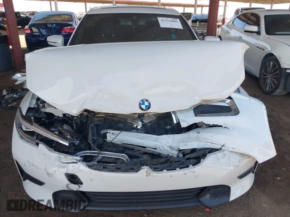 ✅ 2022 BMW 3 Series 330i • VIN: 3MW5R1J01N8C47893 • Lot: 42312006. Listed on IAAI with 25,430 mi. Free auction sales archive from the USA and detailed vehicle history report at DreamBid. Image 12.