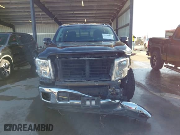 ✅ 2018 Nissan Titan Pro-4X • VIN: 1N6AA1E52JN511884 • Lot: 43594095. Listed on IAAI with 122,006 mi. Free auction sales archive from the USA and detailed vehicle history report at DreamBid. Image 13.