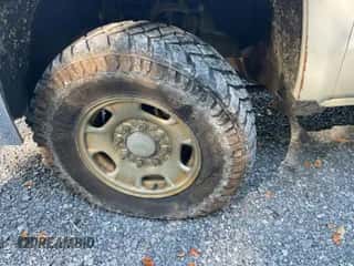 2019 Chevrolet Silverado 2500HD Work Truck z VIN 2GC2KREG2K1135310, wystawiony jako IAAI lot #43064810 z przebiegiem 105 719 mil mil oraz . Historia ofert i sprzedaży dostępna na DreamBid. Obrazek 1.