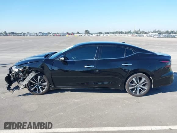 ✅ 2019 Nissan Maxima SV • VIN: 1N4AA6AV0KC369785 • Lot: 43504495. Listed on IAAI with 74,007 mi. Free auction sales archive from the USA and detailed vehicle history report at DreamBid. Image 15.