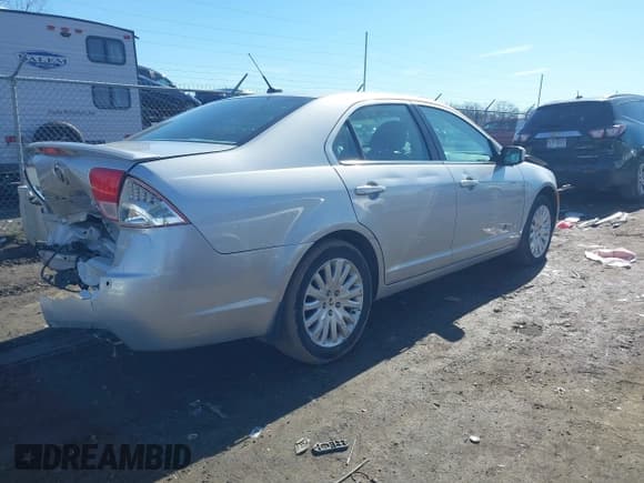 ✅ 2010 Mercury Milan Hybrid • VIN: 3MEDM0L37AR645773 • Lot: 41692785. Listed on IAAI with 99,510 mi. Free auction sales archive from the USA and detailed vehicle history report at DreamBid. Image 4.