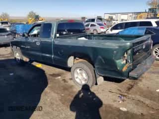 1999 Dodge Dakota SLT z VIN 1B7GG22X0XS239398, wystawiony jako Copart lot #80143414 z przebiegiem 147 646 mil mil oraz Szkoda całkowita • Salvage title. Historia ofert i sprzedaży dostępna na DreamBid. Obrazek 2.