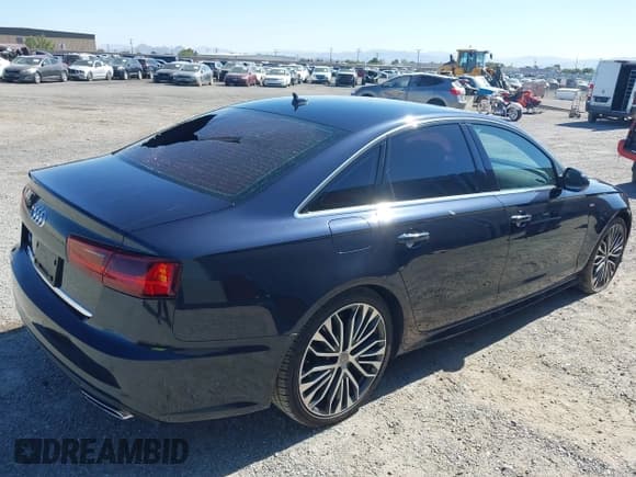 ✅ 2018 Audi A6 Premium • VIN: WAUC8AFC4JN007886 • Lot: 42349818. Listed on IAAI with 103,902 mi. Free auction sales archive from the USA and detailed vehicle history report at DreamBid. Image 4.