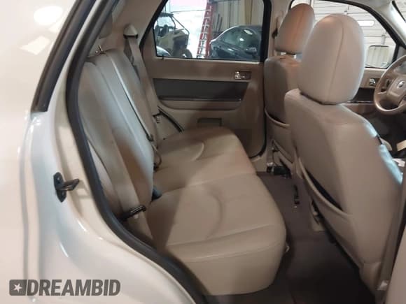 ✅ 2010 Mercury Mariner Premier • VIN: 4M2CN8HGXAKJ00279 • Lot: 41748487. Listed on IAAI with 116,565 mi. Free auction sales archive from the USA and detailed vehicle history report at DreamBid. Image 8.