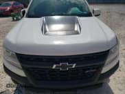 ✅ 2020 Chevrolet Colorado 4WD ZR2 • VIN: 1GCGTEEN5L1134024 • Лот: 71280004. Опубликован ранее на Copart с пробегом 58 288 миль. Бесплатный доступ к архиву аукционных продаж из США и подробный отчёт об истории автомобиля на DreamBid. Изображение 11.