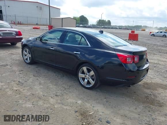 2013 Chevrolet Malibu LTZ with VIN 1G11J5SX1DF303499, listed as a IAAI auction lot 42648683 with 111,496 mi miles and . Bid and sale history available at DreamBid. Image 3.