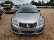 ✅ 2012 Suzuki Kizashi SE • VIN: JS2RE9A31C6101190 • Лот: 73465354. Опубликован ранее на Copart с пробегом 154 466 миль. Бесплатный доступ к архиву аукционных продаж из США и подробный отчёт об истории автомобиля на DreamBid. Изображение 5.
