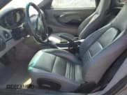 ✅ 2002 Porsche Boxster • VIN: WP0CA29822U622237 • Лот: 64697505. Опубликован ранее на Copart с пробегом Не указан. Бесплатный доступ к архиву аукционных продаж из США и подробный отчёт об истории автомобиля на DreamBid. Изображение 7.